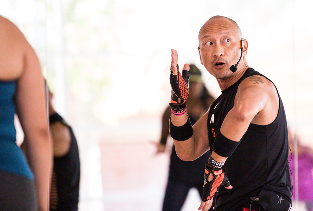 Leading with energy and authority, this instructor commands the room with focus, precision, and motivating presence.